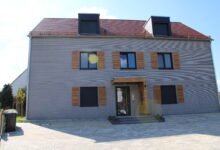 Finished 3D printed house with layered concrete walls in Wallenhausen, Germany