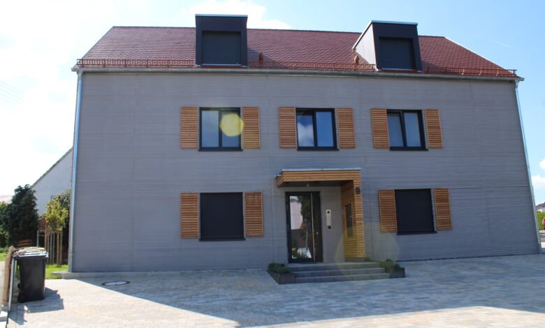 Finished 3D printed house with layered concrete walls in Wallenhausen, Germany